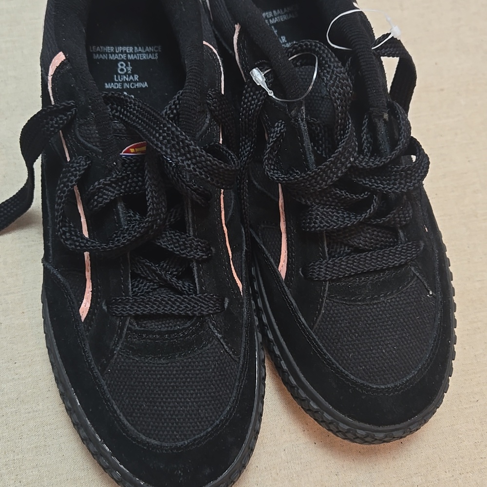 Dickies black with pink striping, size 8.5
